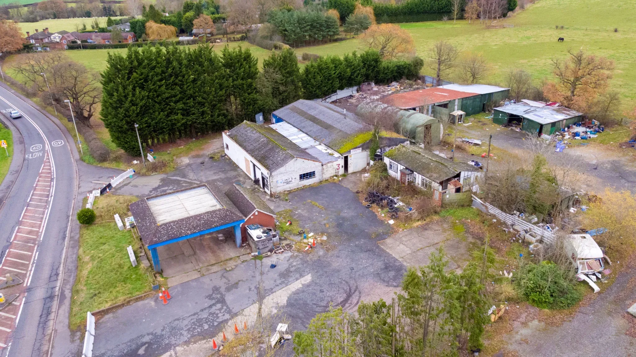 Existing buildings and forecourt