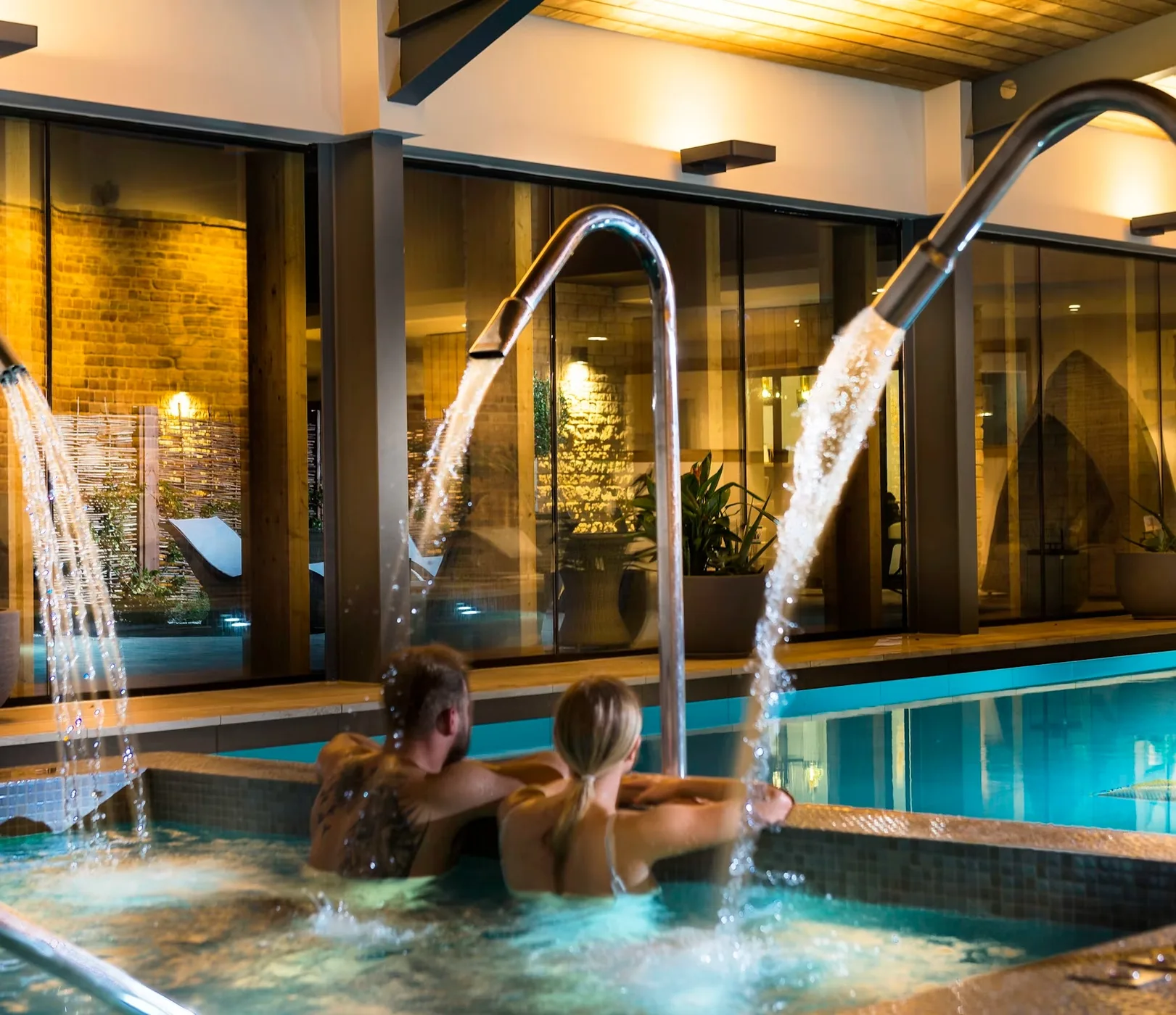 Hydrotherapy pool and water features within the completed spa