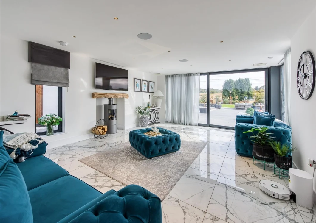 Garden living room with wide sliding doors opening to the terrace